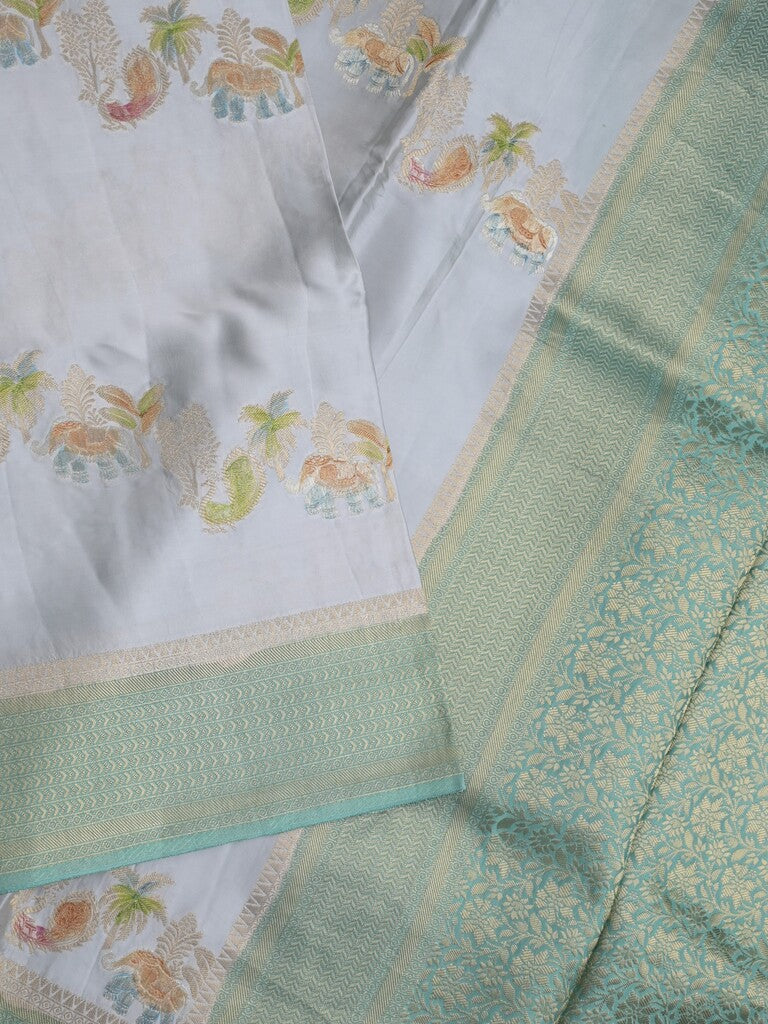 Satin silk fancy saree light blue color allover zari weaves & zari border with zari pallu and plain self blouse