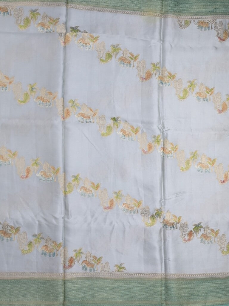 Satin silk fancy saree light blue color allover zari weaves & zari border with zari pallu and plain self blouse
