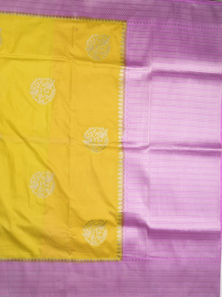Tabby silk fancy saree in yellow color allover zari motifs & zari border with rich pallu and plain blouse