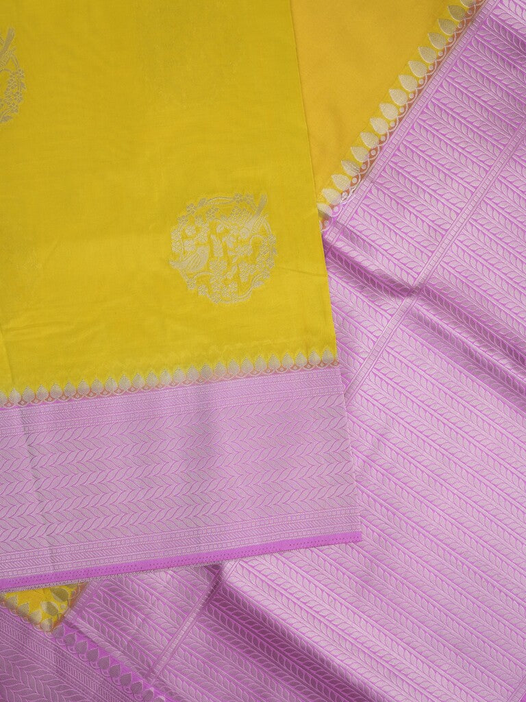Tabby silk fancy saree in yellow color allover zari motifs & zari border with rich pallu and plain blouse