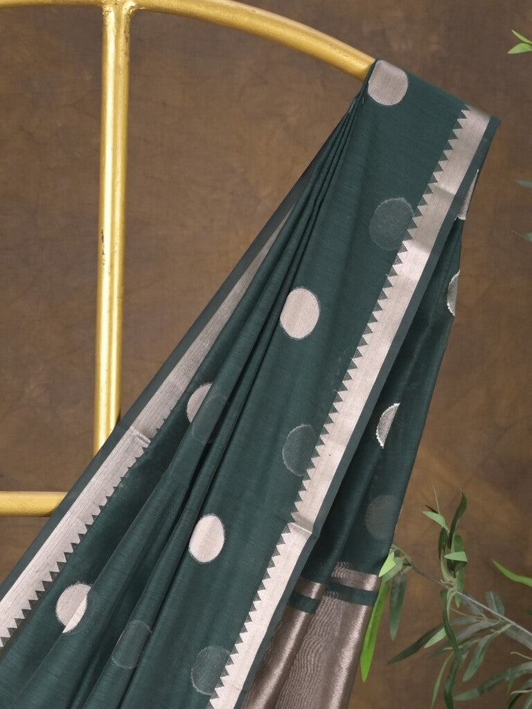 Maheshwari fancy saree in dark green color allover zari motifs & zari border with zari and plain blouse