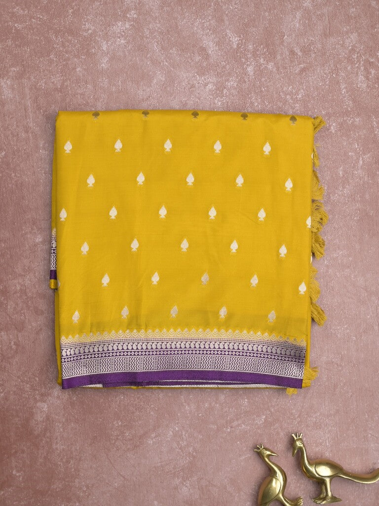 Banaras fancy saree golden yellow color allover zari motifs & zari border with brocade pallu and contrast plain blouse