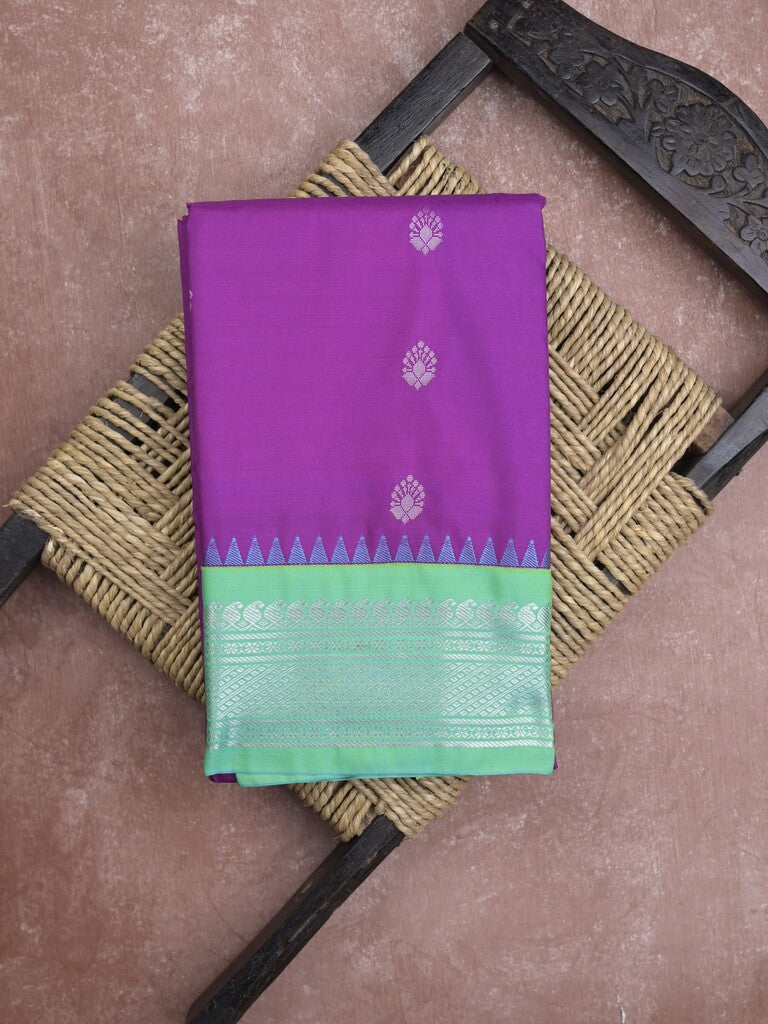 Gadwal pattu saree in violet color allover zari motifs & zari border with rich pallu and plain blouse