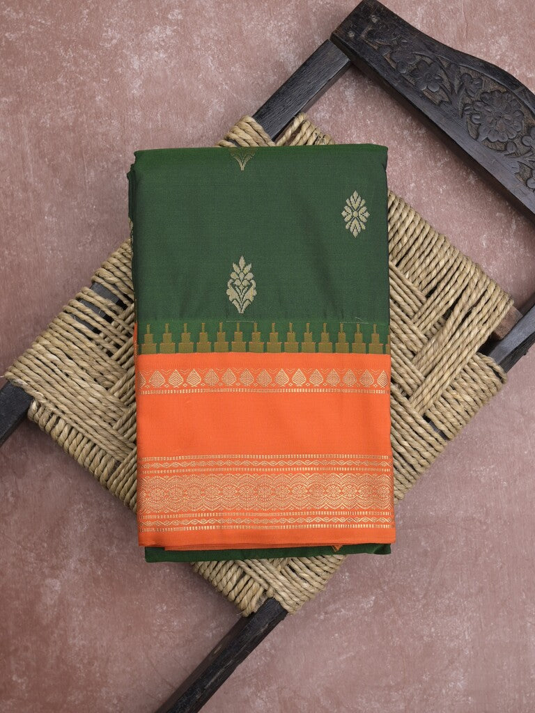 Gadwal pattu saree in bottle green color allover zari motifs & zari border with rich pallu and plain blouse