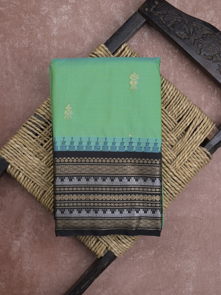 Gadwal pattu saree in lux green color allover zari motifs & zari border with rich pallu and plain blouse