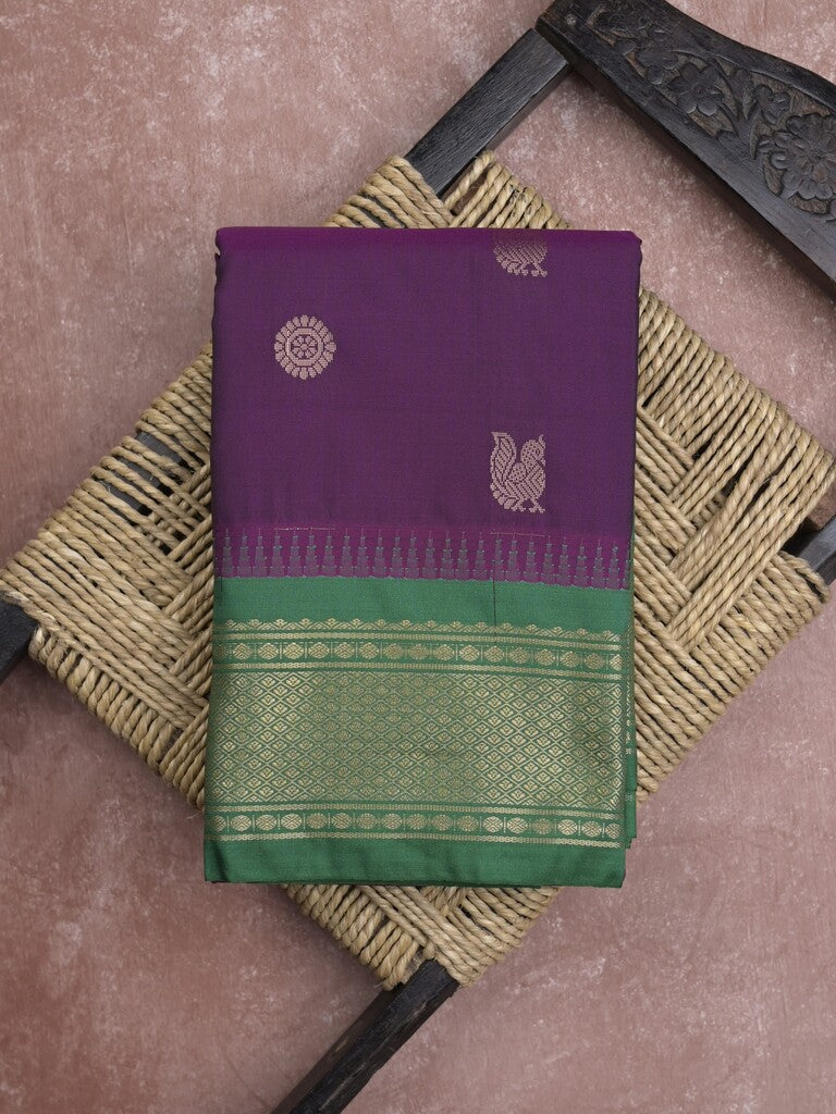 Gadwal pattu saree in violet color allover zari motifs & zari border with rich pallu and plain blouse