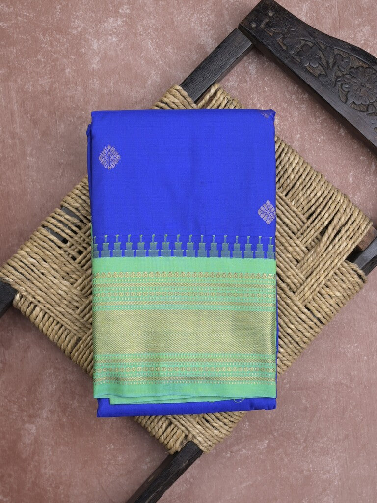 Gadwal pattu saree in royal blue color allover zari motifs & zari border with rich pallu and plain blouse