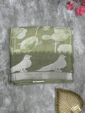 Dola silk fancy saree olive green color allover prints & contrast zari border with printed pallu and printed blouse
