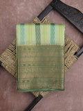 Kanchi kora pattu saree in light green color allover zari stripes & zari border with rich pallu and plain blouse