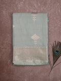Fancy tissue saree in pastel blue color allover zari motifs & zari border with zari pallu and self blouse