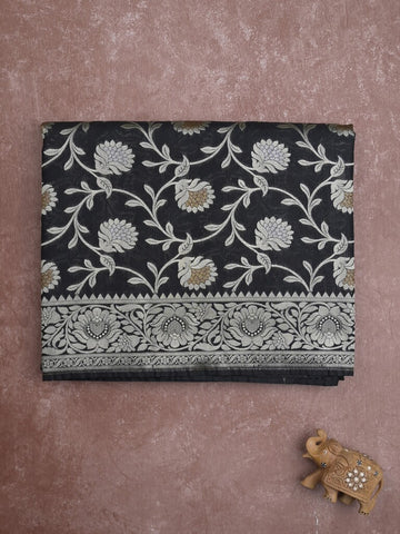Banaras pattu saree in black color allover zari weaves & zari border with rich pallu and striped blouse