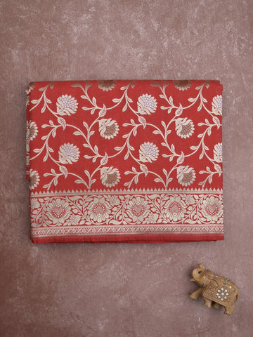 Banaras pattu saree in red color allover zari weaves & zari border with rich pallu and striped blouse