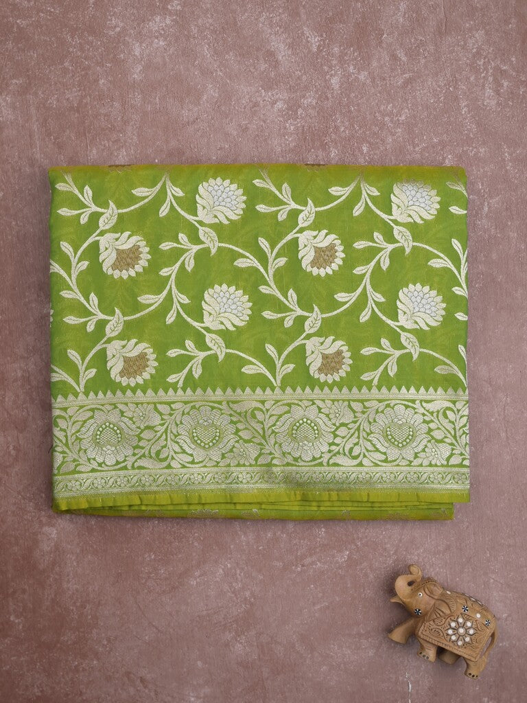 Banaras pattu saree in parrot green color allover zari weaves & zari border with rich pallu and striped blouse