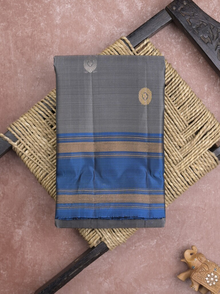 Kanchi pattu saree in grey color allover zari motifs & zari border with rich pallu and plain blouse