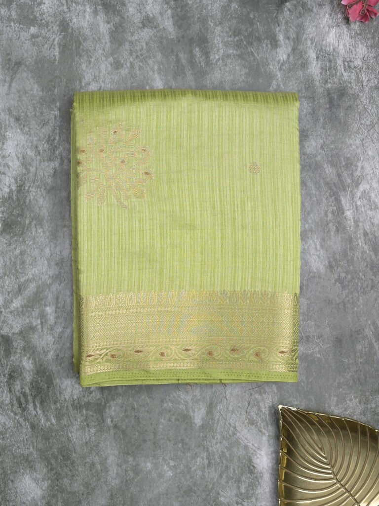 Dupion fancy saree light pista green color allover zari motifs & zari border with zari pallu and plain blouse