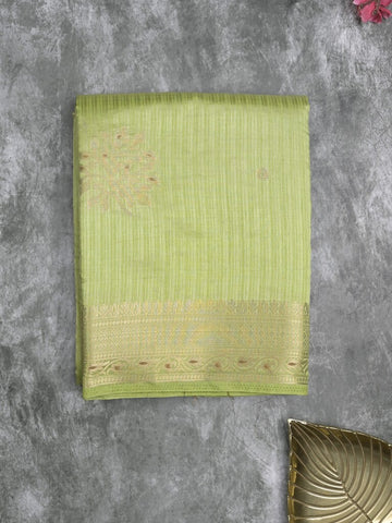 Dupion fancy saree light pista green color allover zari motifs & zari border with zari pallu and plain blouse