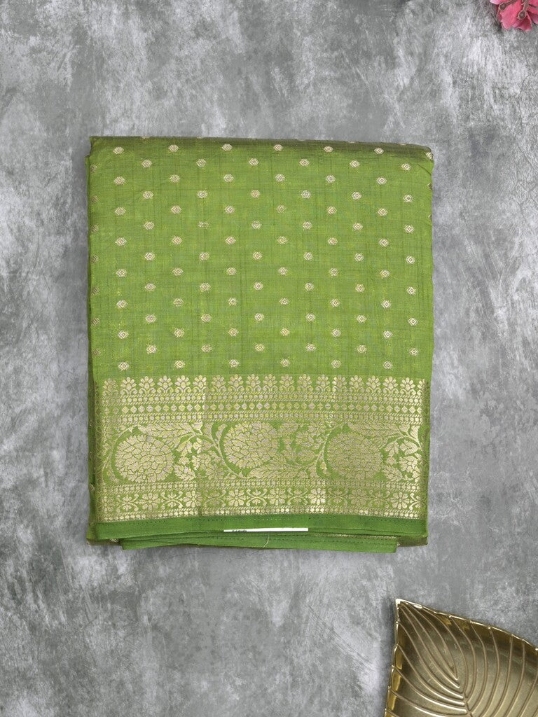 Dupion fancy saree parrot green color allover zari motifs & zari border with zari pallu and running blouse