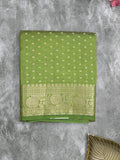 Dupion fancy saree parrot green color allover zari motifs & zari border with zari pallu and running blouse
