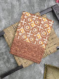 Crape fancy saree brown color allover prints & contrast border with printed pallu and attached plain blouse