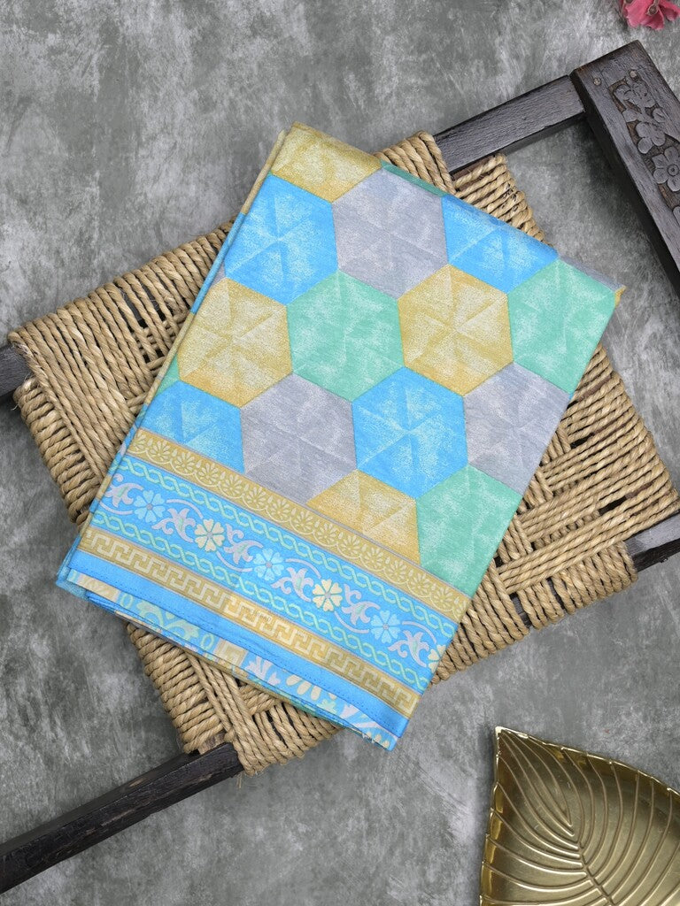Crape fancy saree sky blue color allover prints & contrast border with printed pallu and attached plain blouse