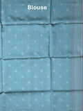Tussar fancy saree light grey color allover motifs & weaving border with contrast pallu and attached blouse