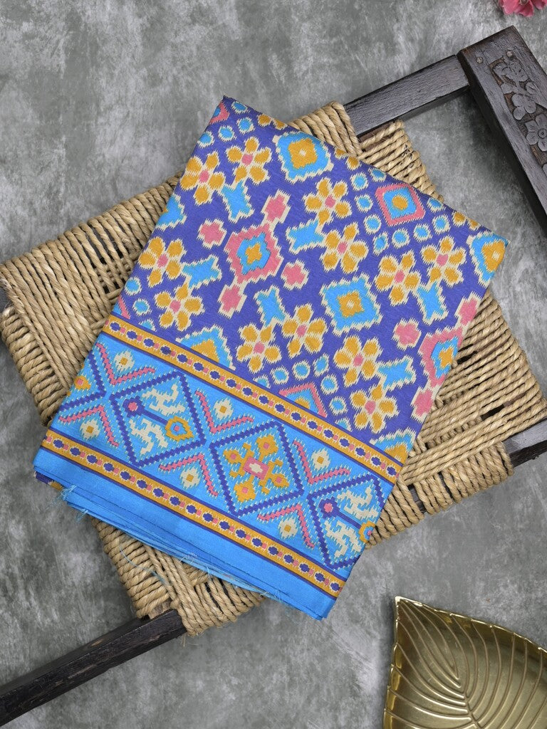 Crape fancy saree blue color allover prints & contrast border with printed pallu and attached plain blouse