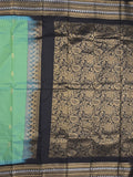 Gadwal pattu saree in lux green color allover zari motifs & zari border with rich pallu and plain blouse