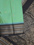 Gadwal pattu saree in lux green color allover zari motifs & zari border with rich pallu and plain blouse