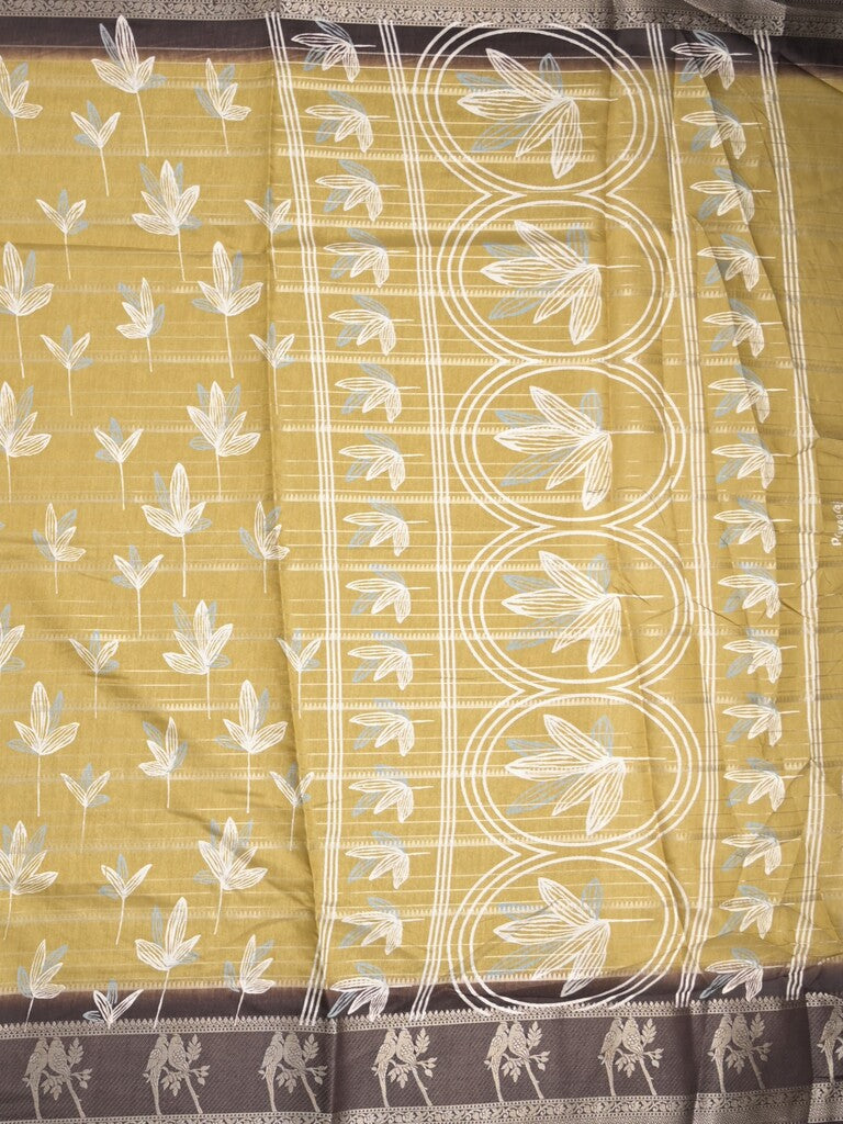 Dola silk fancy saree light mustard yellow color allover prints & contrast zari border with printed pallu and printed blouse