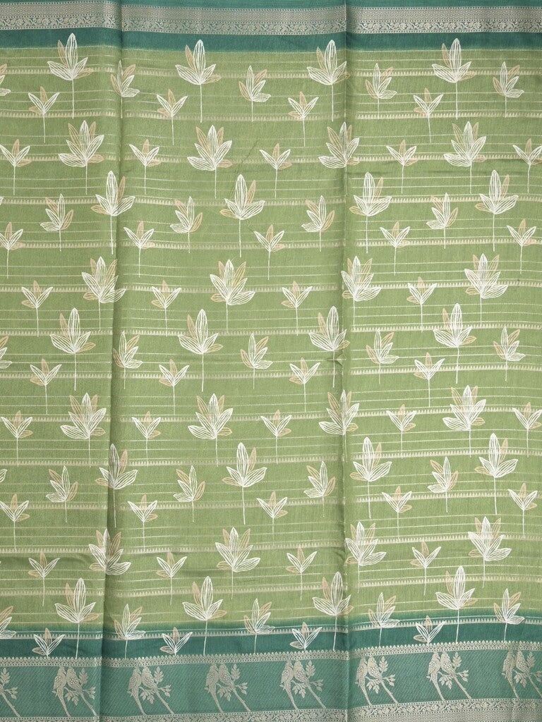 Dola silk fancy saree leaf green color allover prints & contrast zari border with printed pallu and printed blouse