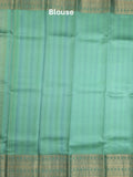 Kanchi kora pattu saree in lux green color allover zari stripes & zari border with rich pallu and plain blouse