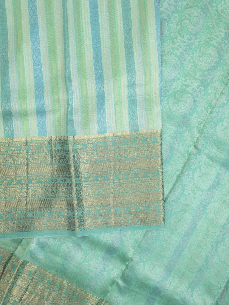 Kanchi kora pattu saree in lux green color allover zari stripes & zari border with rich pallu and plain blouse