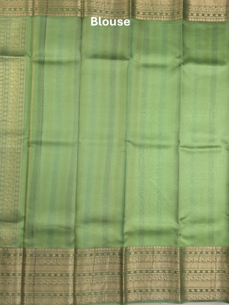 Kanchi kora pattu saree in light green color allover zari stripes & zari border with rich pallu and plain blouse
