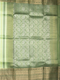 Kanchi kora pattu saree in light green color allover zari stripes & zari border with rich pallu and plain blouse