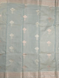 Fancy tissue saree in pastel blue color allover zari motifs & zari border with zari pallu and self blouse