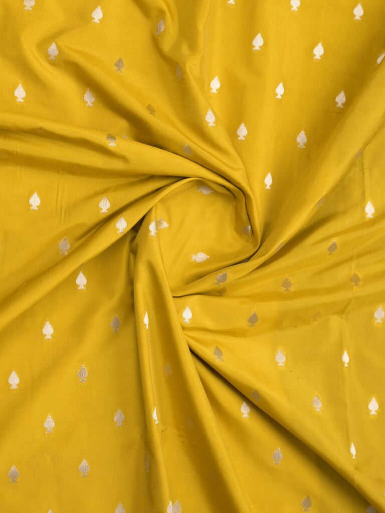 Banaras fancy saree golden yellow color allover zari motifs & zari border with brocade pallu and contrast plain blouse