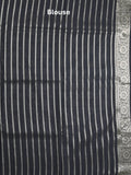 Banaras pattu saree in black color allover zari weaves & zari border with rich pallu and striped blouse