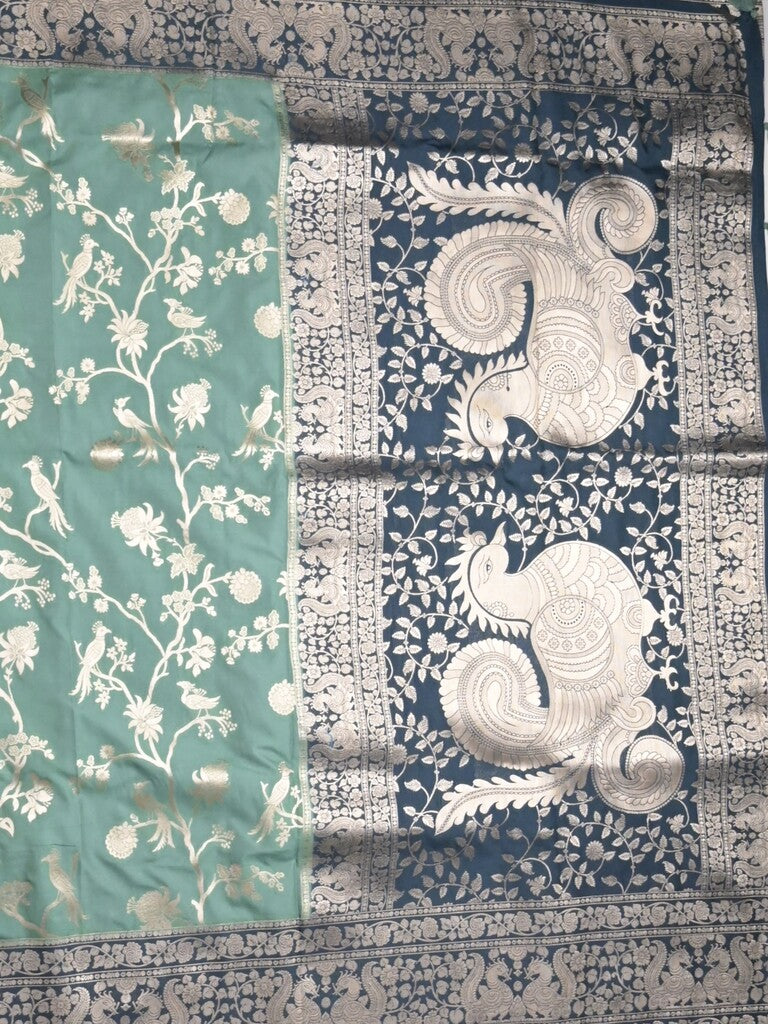 Banaras fancy saree lux green color allover zari weaves & zari border with rich pallu and plain blouse