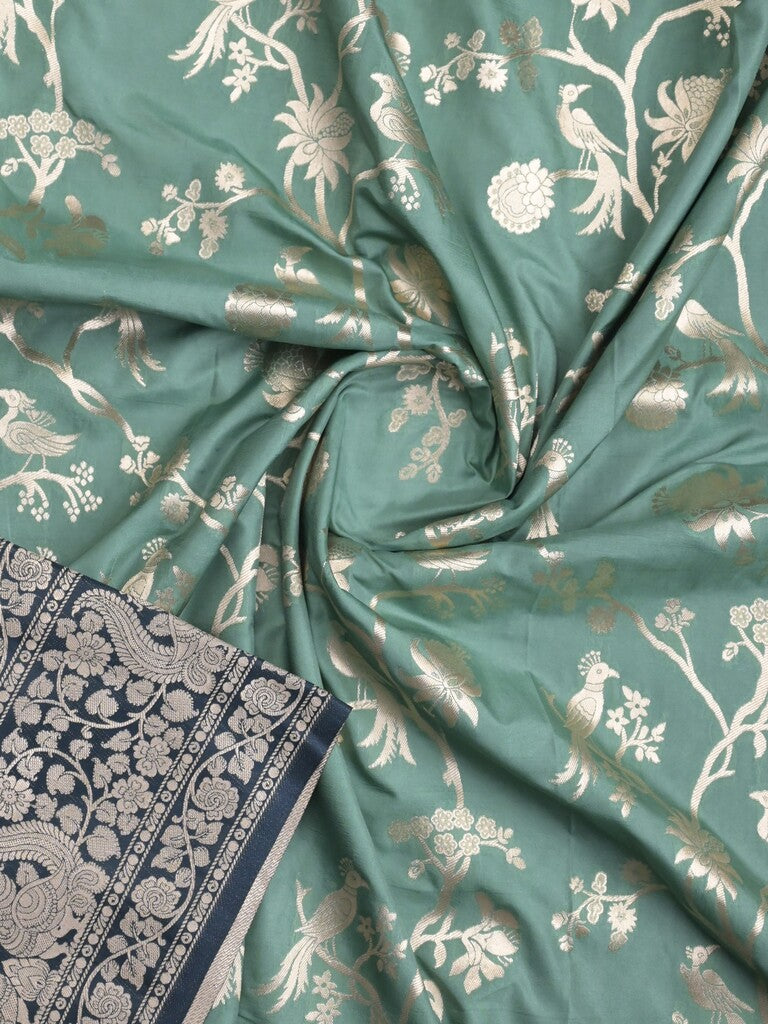Banaras fancy saree lux green color allover zari weaves & zari border with rich pallu and plain blouse