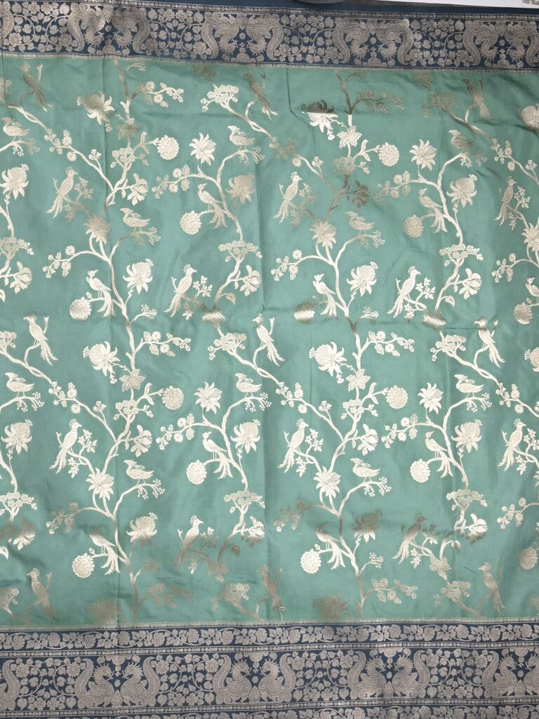 Banaras fancy saree lux green color allover zari weaves & zari border with rich pallu and plain blouse