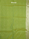 Banaras pattu saree in parrot green color allover zari weaves & zari border with rich pallu and striped blouse