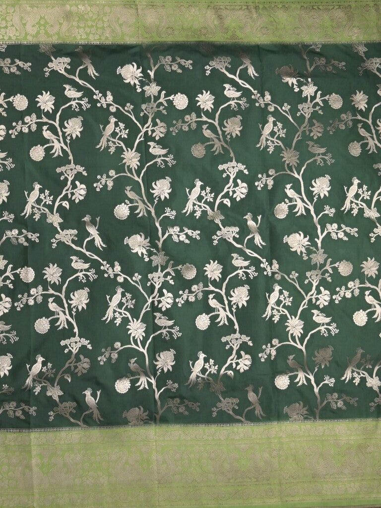 Banaras fancy saree bottle green color allover zari weaves & zari border with rich pallu and plain blouse