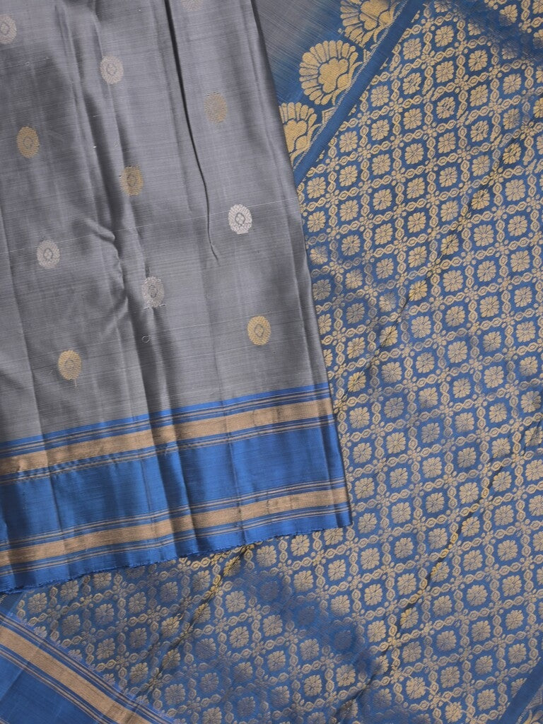 Kanchi pattu saree in grey color allover zari motifs & zari border with rich pallu and plain blouse