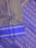 Kanchi pattu saree in bluish brown color allover zari motifs & zari border with rich pallu and plain blouse