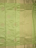 Dupion fancy saree light pista green color allover zari motifs & zari border with zari pallu and plain blouse