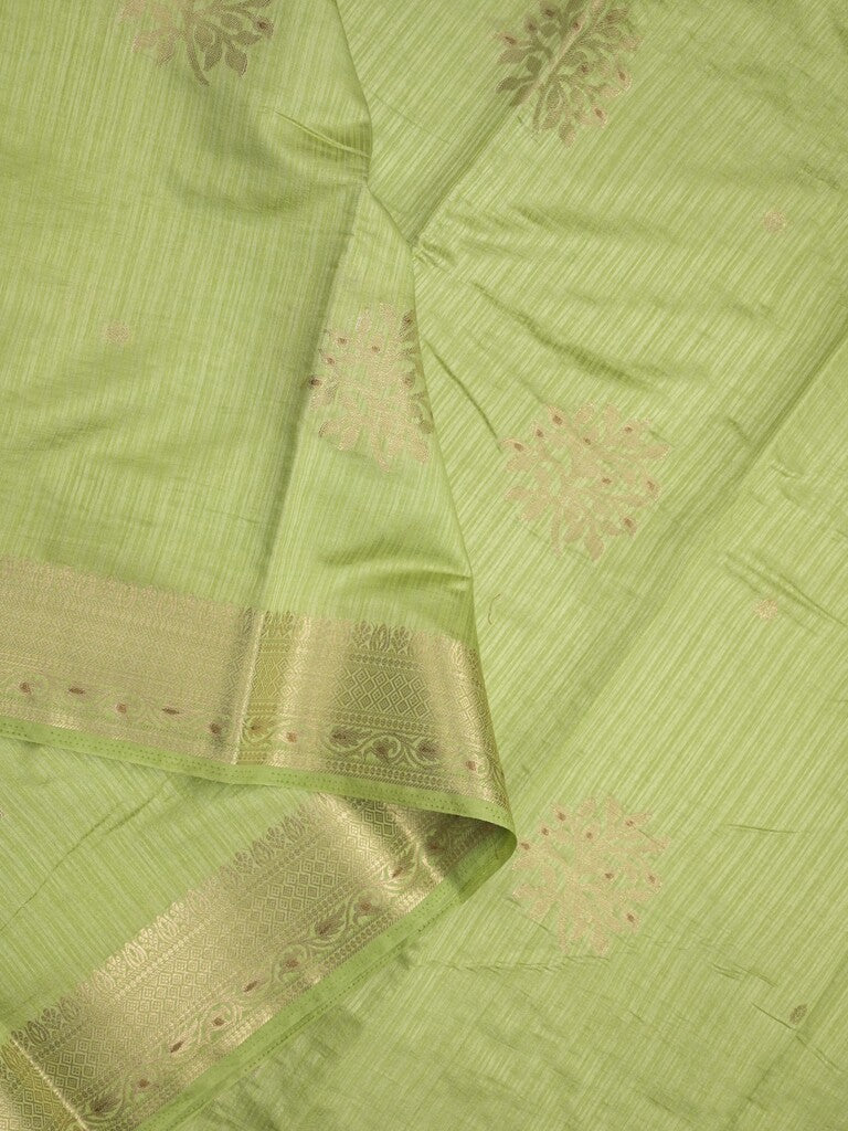 Dupion fancy saree light pista green color allover zari motifs & zari border with zari pallu and plain blouse