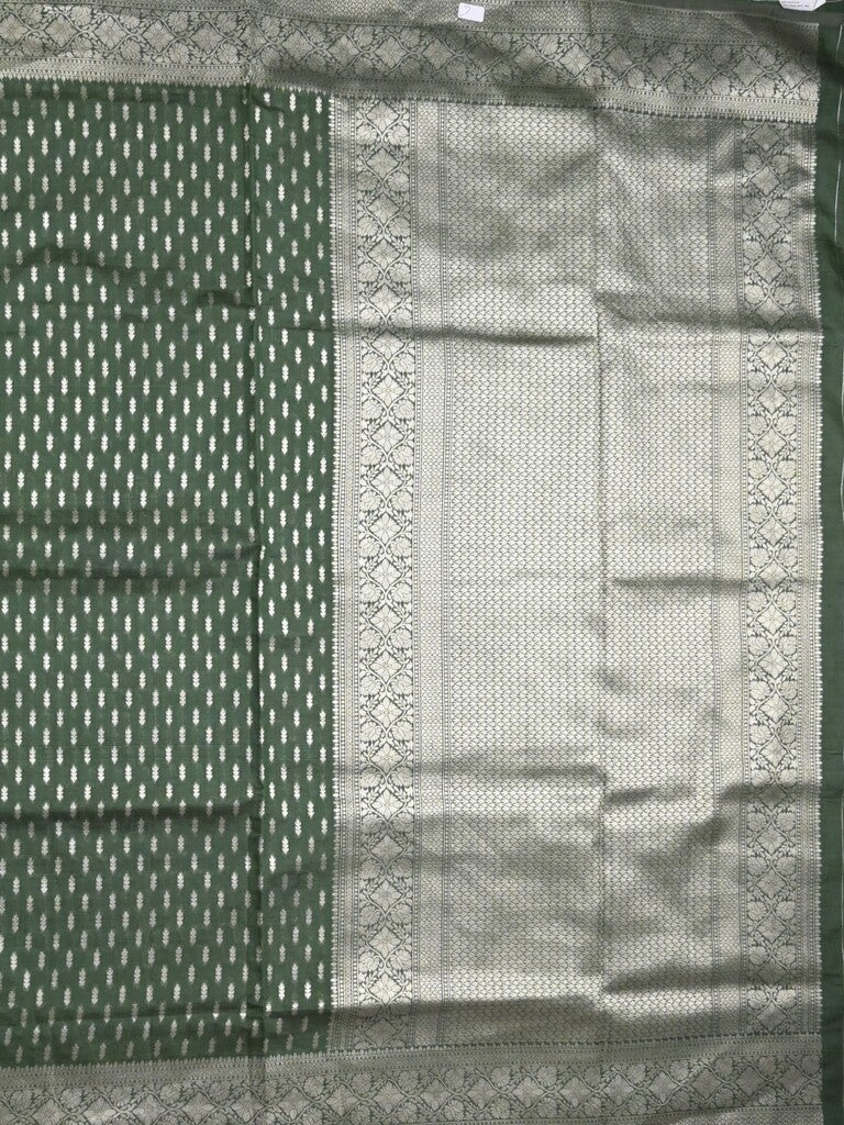 Dupion fancy saree bottle green color allover zari motifs & zari border with rich pallu and plain blouse