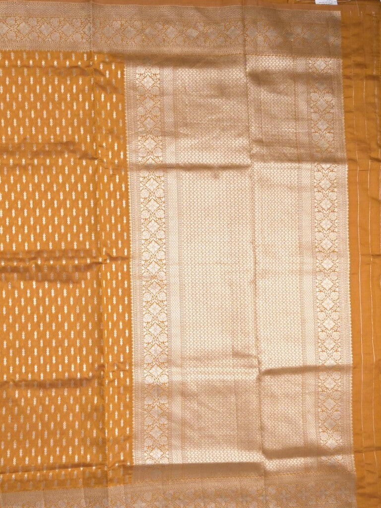 Dupion fancy saree golden yellow color allover zari motifs & zari border with rich pallu and plain blouse