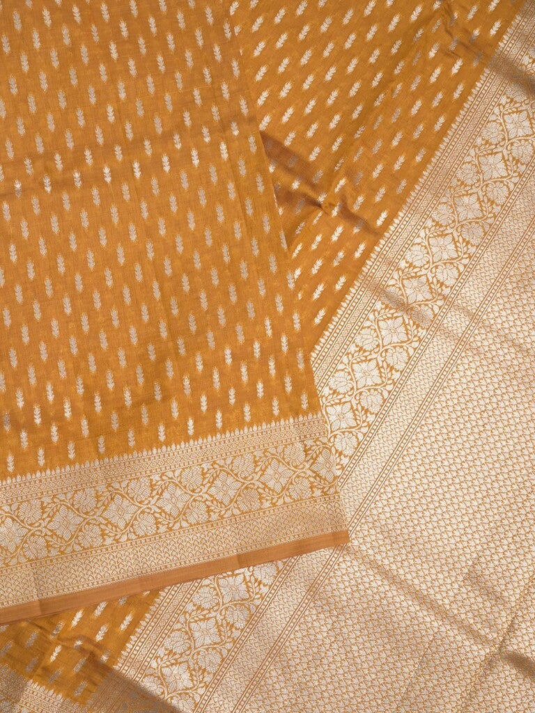 Dupion fancy saree golden yellow color allover zari motifs & zari border with rich pallu and plain blouse