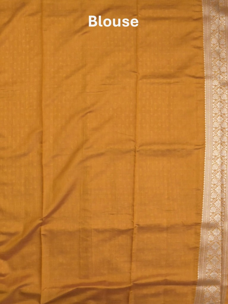 Dupion fancy saree golden yellow color allover zari motifs & zari border with rich pallu and plain blouse